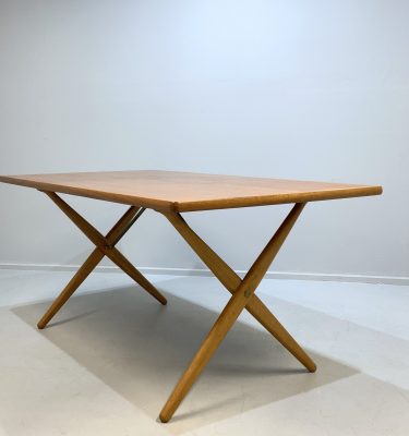 Hans Wegner for Andreas Tuck Model AT 303 Teak and Oak Dining Table. Danish, 1950s